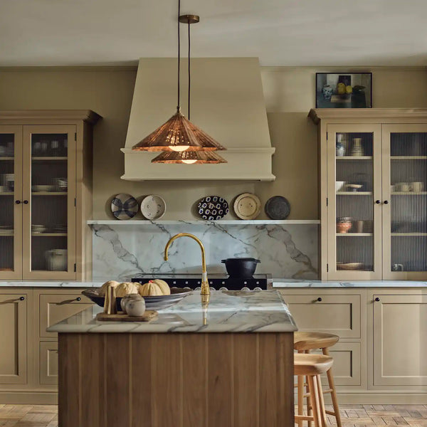 Henley kitchen with Honed Slate painted cabinetry, oak island, marble worktops and glass-fronted cupboards.
