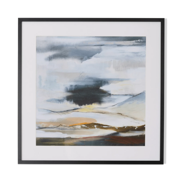 A framed abstract landscape painting with layered brushstrokes of gray, white, black, beige, and brown, presented in a black frame with a white mat against a clean white background.