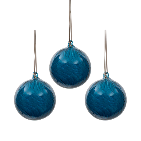 Three blue textured glass hanging ornaments with silver metal hanging wires, arranged symmetrically on a solid white background.