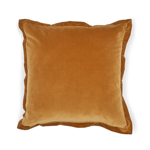A square velvet throw pillow in a warm camel brown color, shown from a top-down view on a white background.