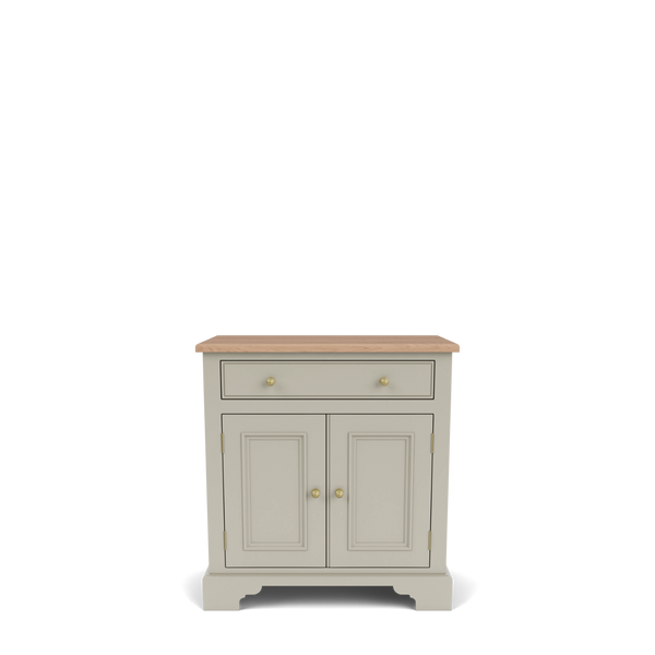 A small painted cabinet with two doors, a single drawer, brass-style round knobs, and a natural wood top, shown on a clean white background.