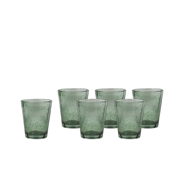 Six small translucent green drinking glasses with a speckled, textured finish, arranged in two rows on a plain white background.
