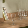 Greenwich wine glasses on wooden ledge