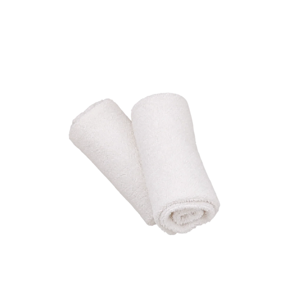 Two luxury cotton white flannels shown neatly rolled on a white background