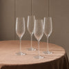 Islington Champagne Glasses on table with linen tablecloth