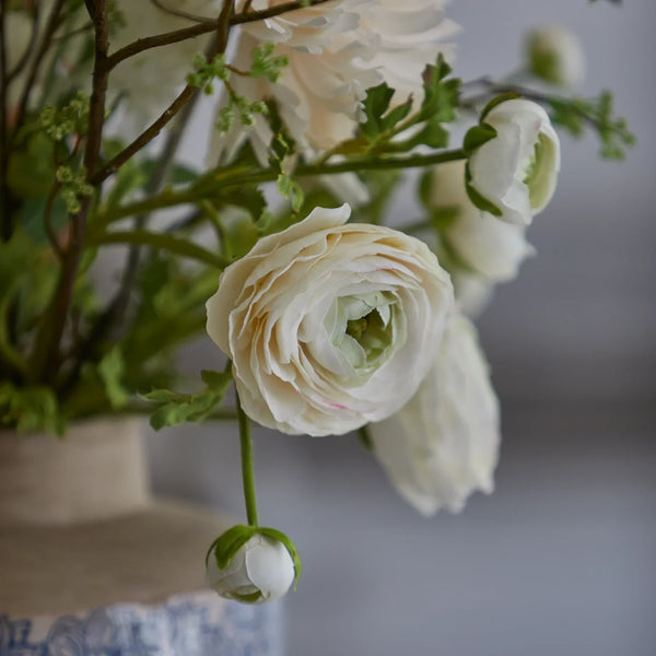 Ranunculus white faux flowers bundle shown in vase