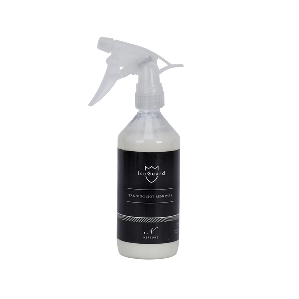 A clear plastic spray bottle filled with white liquid, featuring a black label with the brand name 'IsoGuard' and the text 'Tanning Spot Remover'. The spray trigger is white and transparent, set against a plain white background.