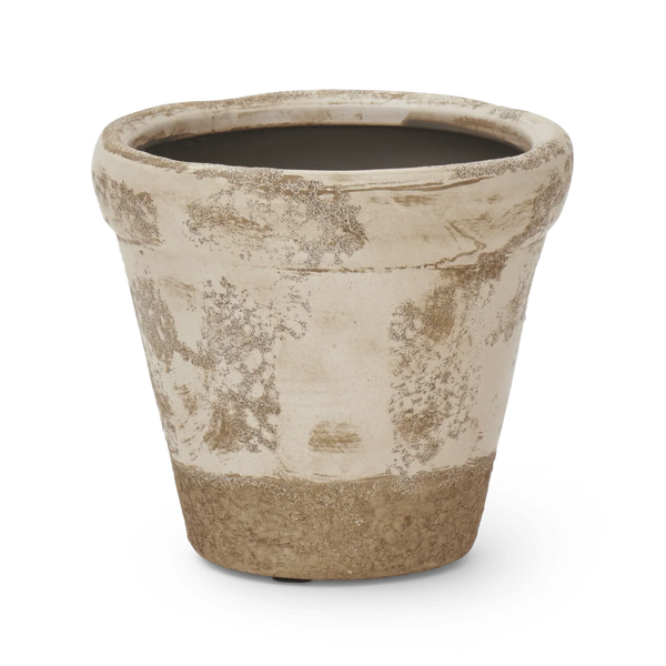 A small terracotta-style planter pot with a rustic, distressed finish. The pot features a warm beige and cream glaze with textured brown patches, and a solid brown band around the base.