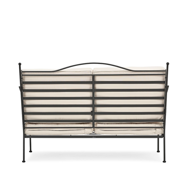 Metal garden sofa with natural cushion on a white background