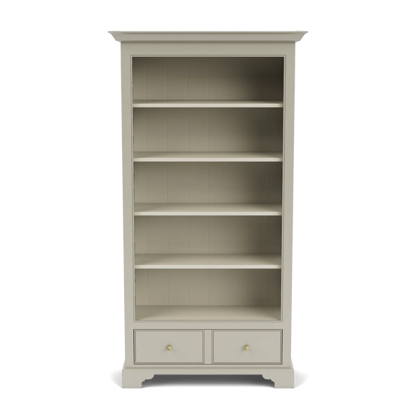 Chichester tall bookcase with open shelving and lower drawer, shown from the front.