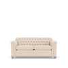 Cut out of a cream button back Chesterfield style sofa with rolled arms