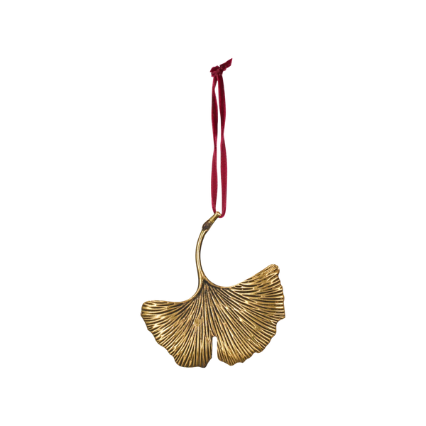 A gold-finished ginkgo leaf hanging ornament with a red ribbon loop at the top, shown against a plain white background.