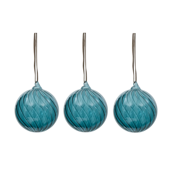 Three matching teal blue textured glass hanging ornaments with silver metal hanging wires, shown against a plain white background.