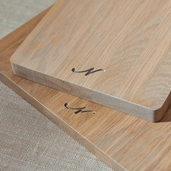 Close up of oak cutting boards with embossed N logo