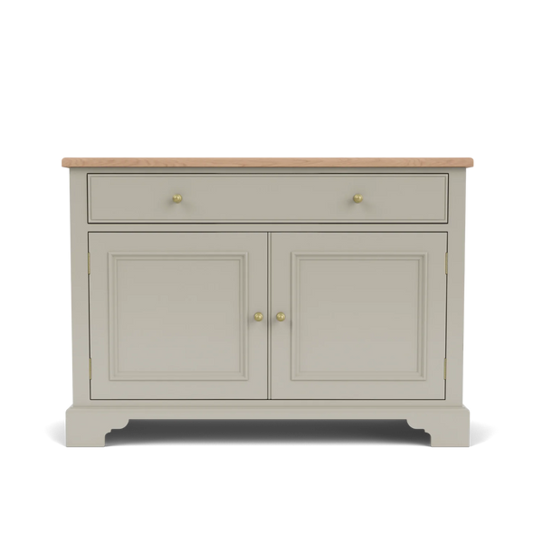 A classic sideboard cabinet with a light gray painted body, a natural wood top, and brass hardware, shown against a plain white background.