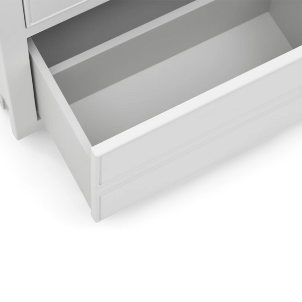 Close-up of a light gray drawer pulled open, showing the interior and front panel against a white background.