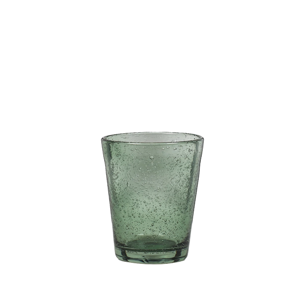 Small translucent green drinking glass with a speckled, textured finish, on a plain white background.