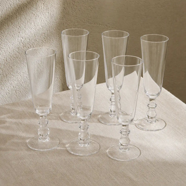 Greenwich Champagne Flutes on table with linen tablecloth