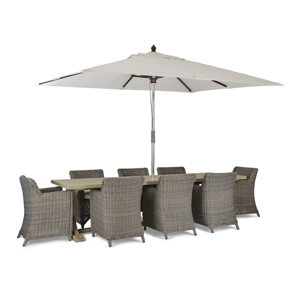 An 8-piece outdoor dining set featuring a rectangular wicker table, eight matching armchairs, and a large beige patio umbrella, shown on a solid white background.