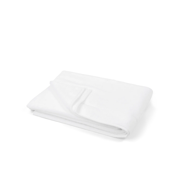 A folded white cotton towel, neatly folded on a seamless white background.
