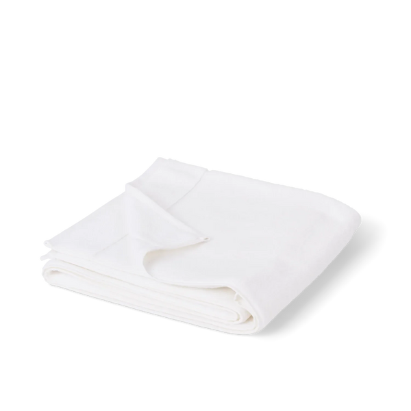 A folded white cotton towel, shown on a clean white background with a soft shadow.