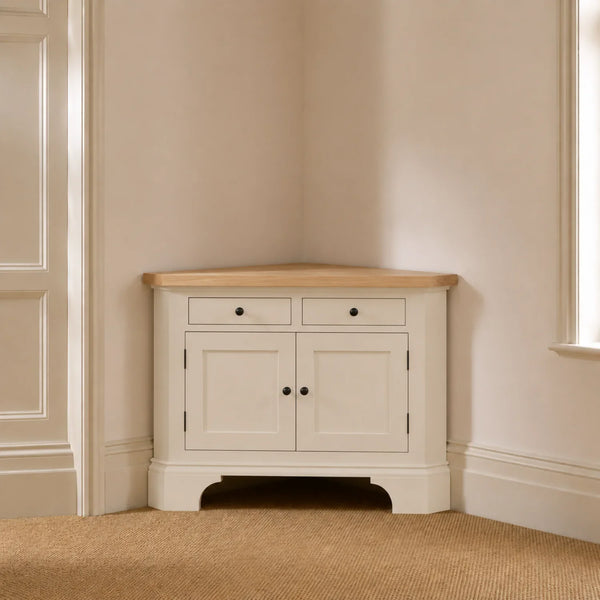Henley 3ft 6 Corner AV Cabinet in Silver Birch with oak top, styled in a softly lit neutral room corner.