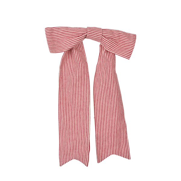 Red and white striped decorative bow on white background