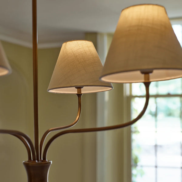 Regency small four light pendant in brass with linen shades