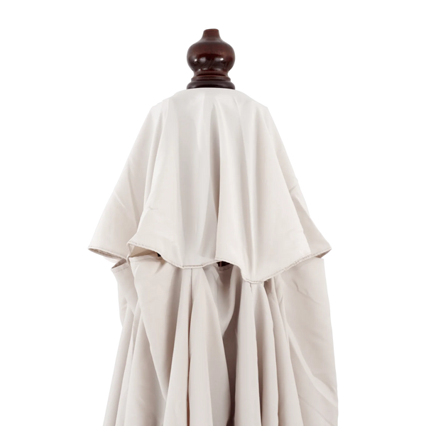 A folded patio umbrella canopy in a light beige or taupe color against a solid white background.