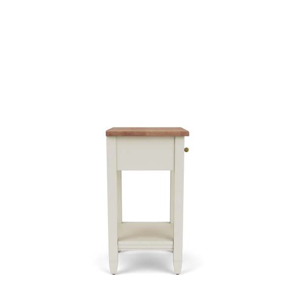 Side view of the Chichester open bedside cabinet, highlighting its slim profile, natural oak top, open lower shelf and painted timber construction.