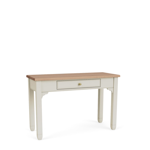 Chichester writing desk with painted frame and natural oak top, shown from an angled view.
