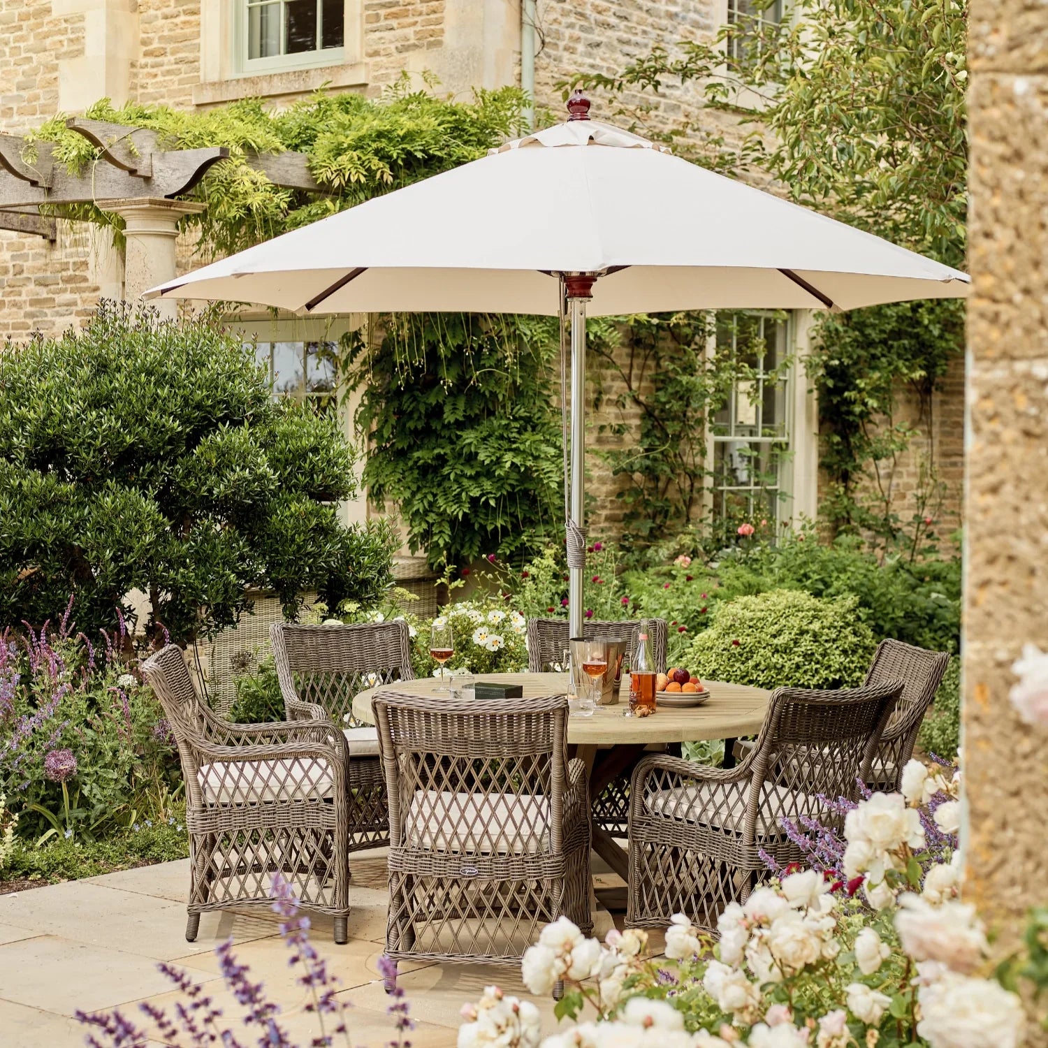 Harmondsworth 6 Seater Round Teak Garden Dining Table Set with Harrington Carver Chairs & Parasol